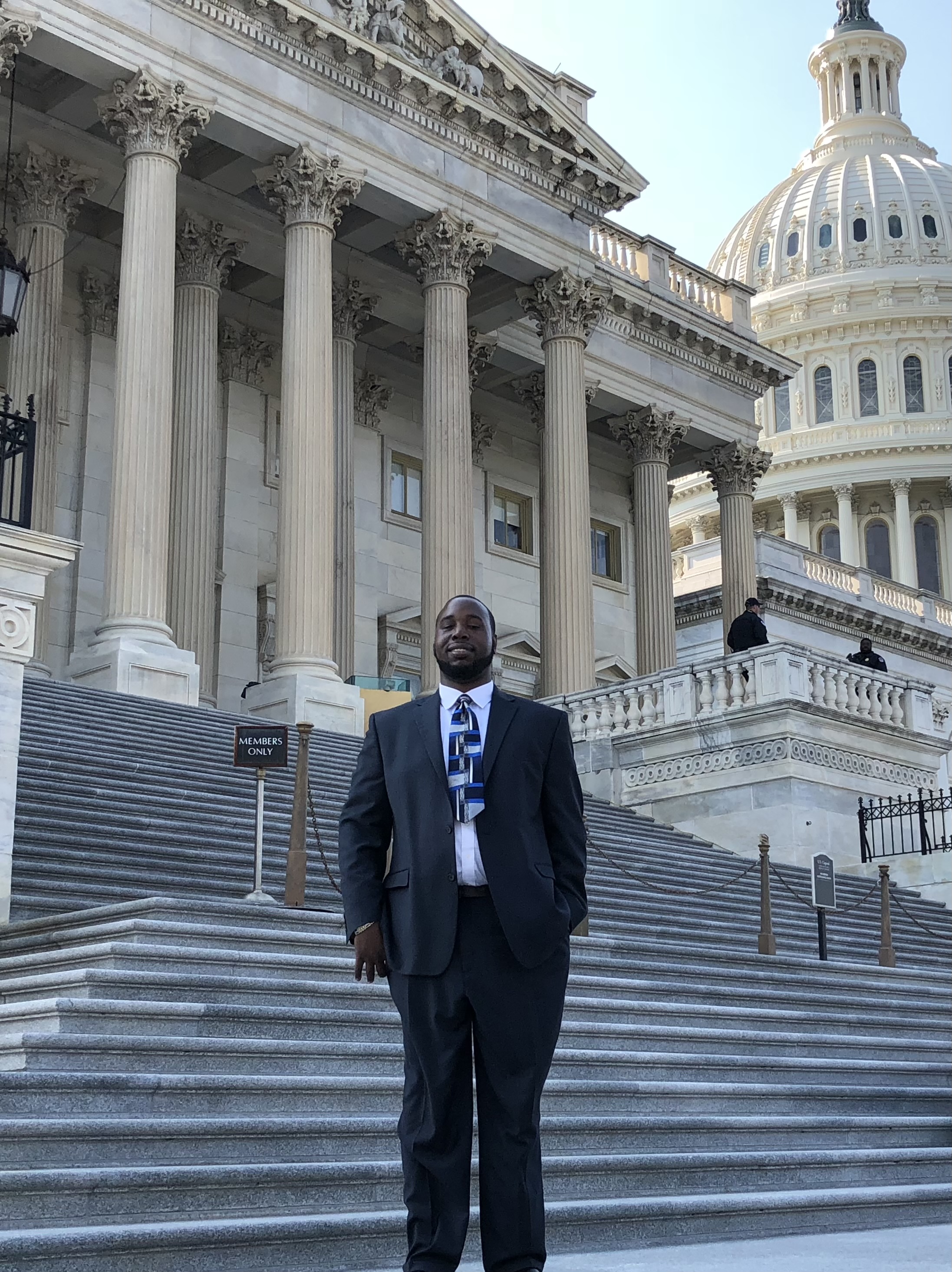 Ray on the steps of Capitol Hill.