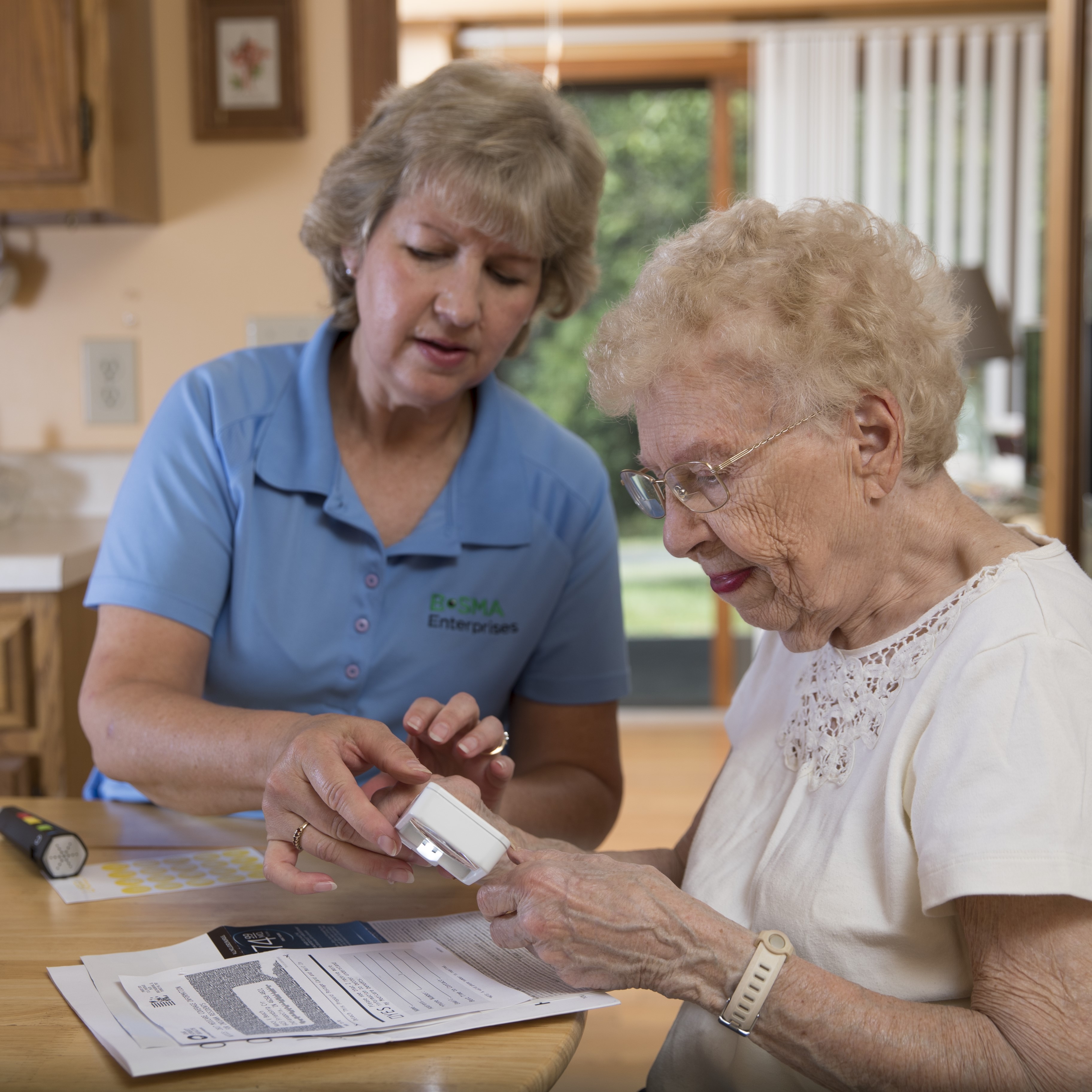 teacher helping older student