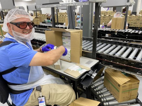 Randall packaging gloves on the glove production line at Bosma