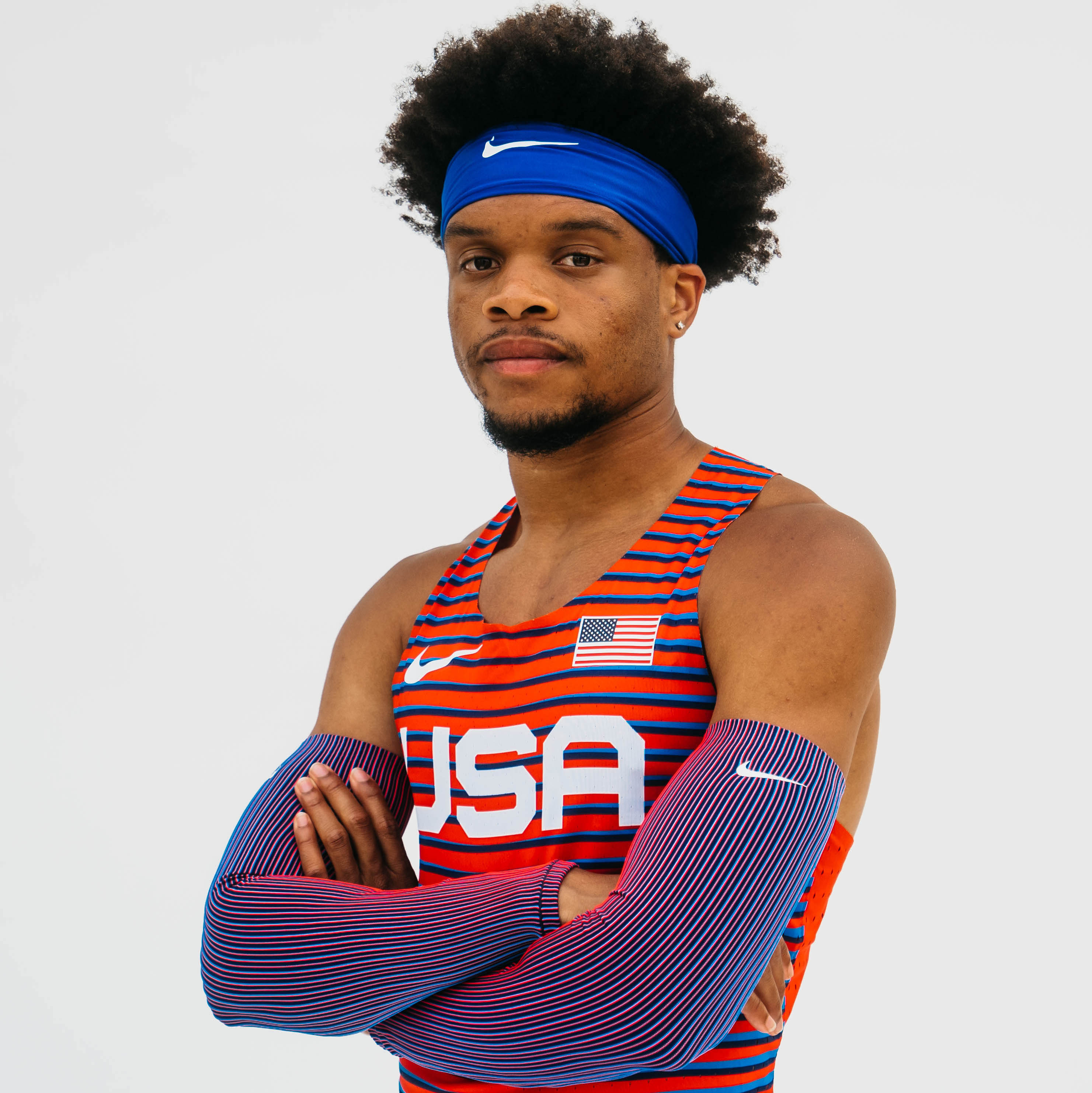 Noah in his Team USA uniform with his arms crossed.