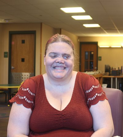 Jody May smiling at camera